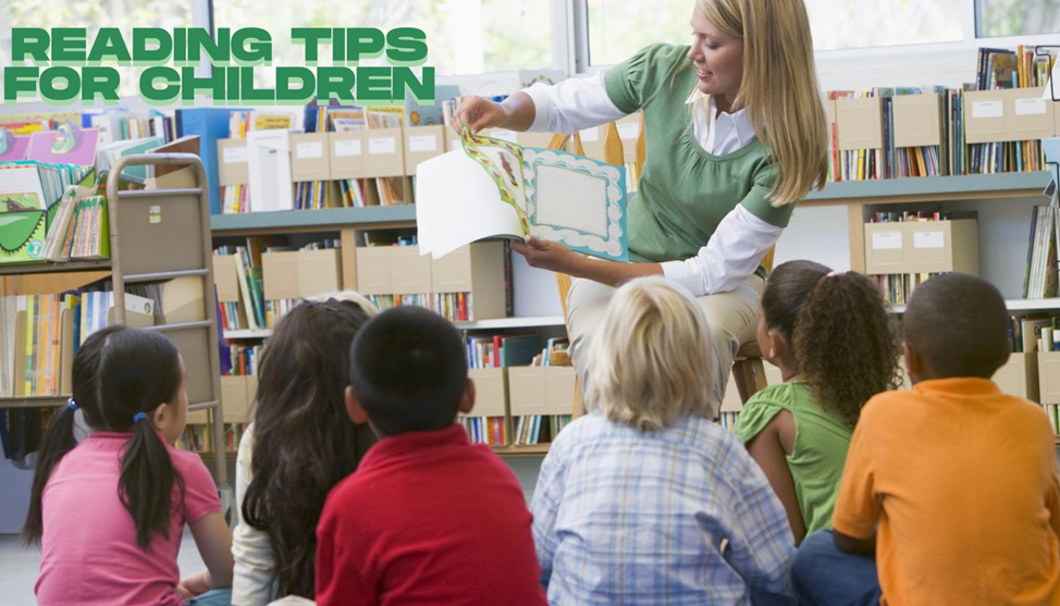 Cheerful young child sitting cross-legged surrounded by colorful children's books, holding an open picture book with a bright smile, illustrating the joy of reading.